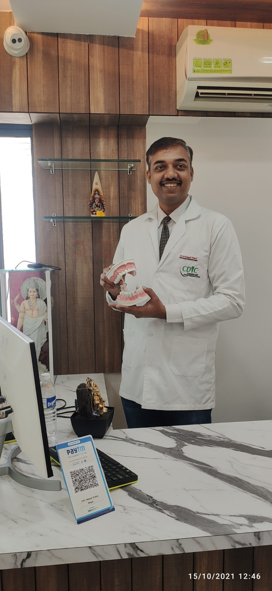 Dr. Swapnil B. Patil, founder of CDIC Smiles, in his clinic